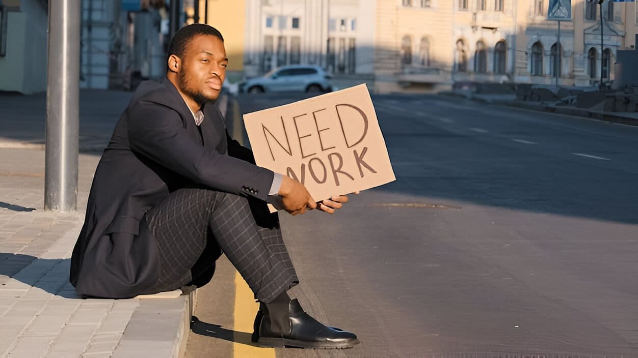 Young Ugandan graduate looking for jobs online in 2025